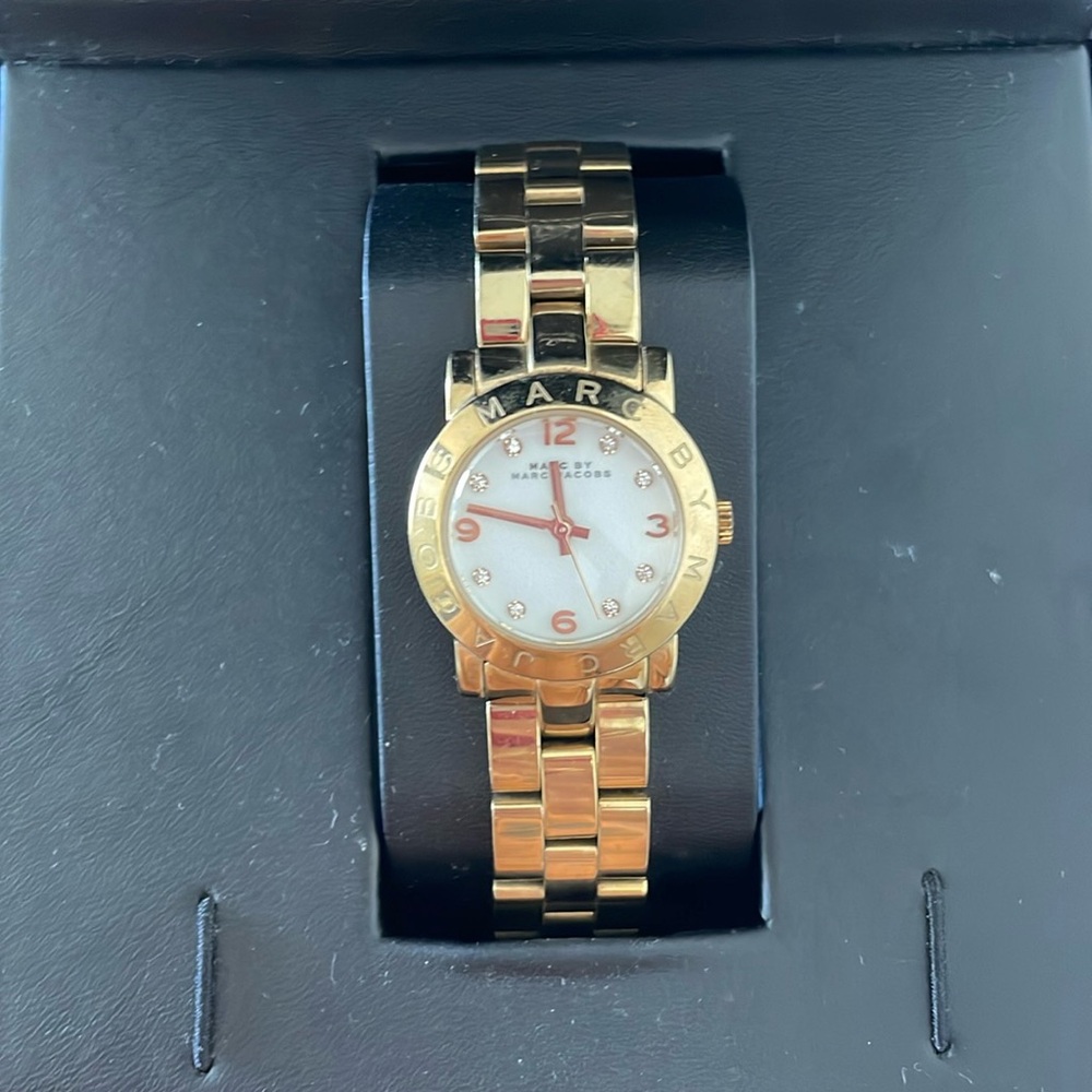 Marc Jacobs gold watch. Gently used, just needs new battery. Small wrist